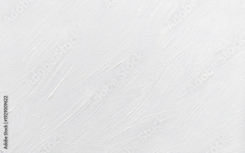 
​White oil paint texture with expressive brush strokes on canvas.