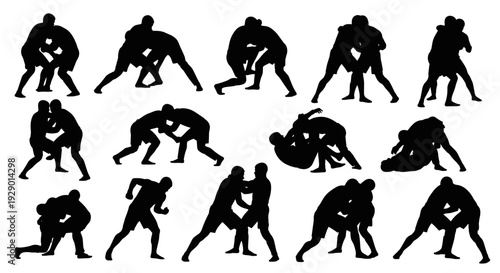 Silhouettes of Wrestlers in Dynamic Action Poses Showcasing Motion and Intensity in Sport.
