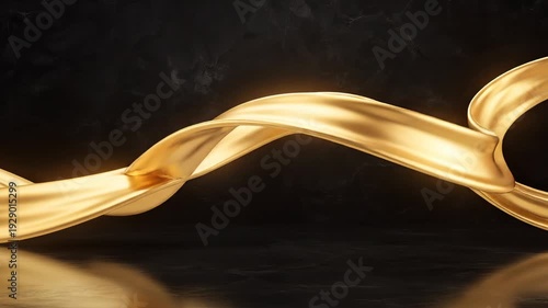 Golden ribbon flowing on dark surface