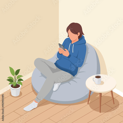 Woman relaxing on a bean bag chair with a mobile phone.