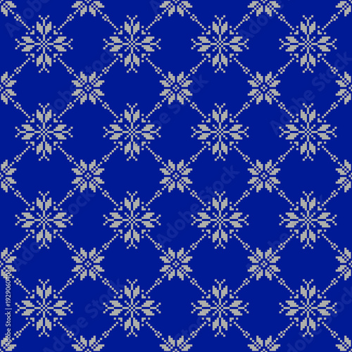 Seamless blue pixel pattern with geometric snowflake motifs. Winter-inspired digital design in retro pixel art style, ideal for textiles, wrapping paper, backgrounds, seasonal prints, and decorative 