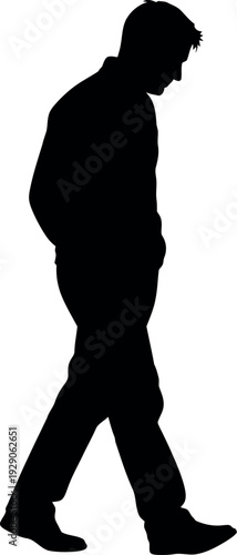 Silhouette of a man walking alone in a suit