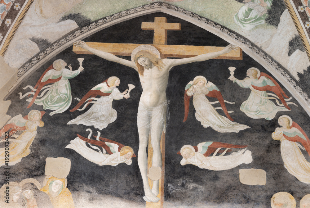 Obraz premium NOVARA, ITALY - JANUARY 16, 2026: The fresco of Crucifixion among the angels in the church Chiesa di San Nazaro by unknown artis from 15. cent.