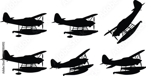 Black silhouettes of six seaplanes in various orientations airplanes white background