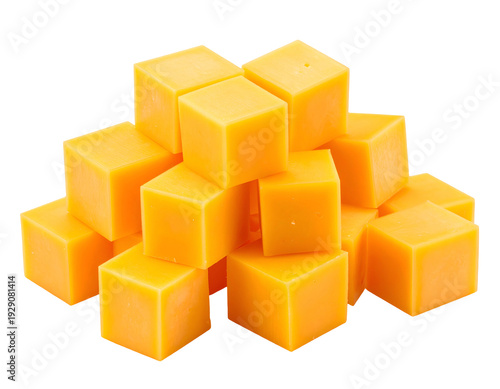 A pile of uniformly cut, vibrant orange cheddar cheese cubes