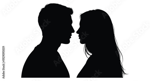 A striking visual of a man and woman facing each other in a dark romantic pose depicted as a silhouette