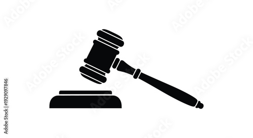 A stark black silhouette of a gavel resting upon a sound block representing legal authority and justice silhouette