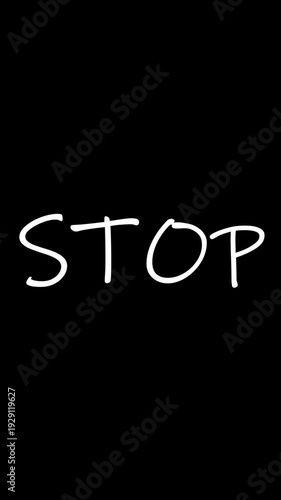 Stop word handwritten white text on black background video