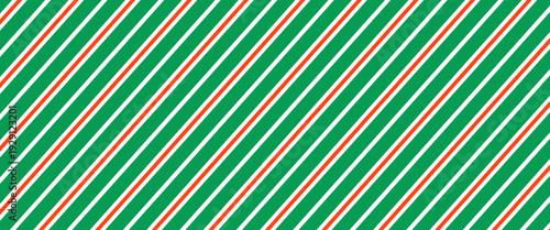 Christmas seamless pattern. Red and green diagonal stripes background. Candy cane repeating decoration wallpaper. Winter holiday lines backdrop. vector