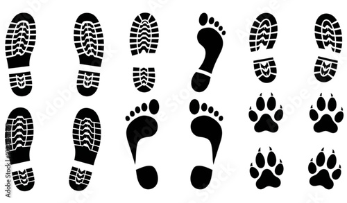 A set of black footprints and paw prints in various styles and directions