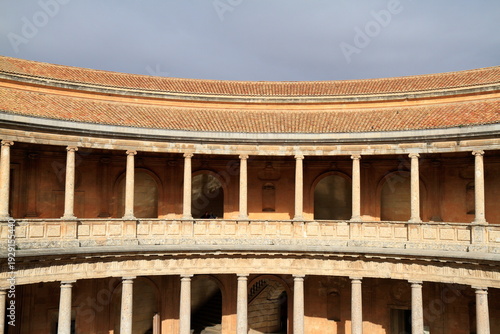 Alhambra Courtyard With Ornate Moorish Arches and Tower
