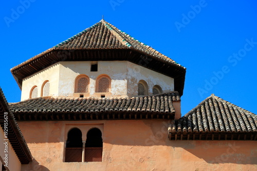Alhambra Courtyard With Ornate Moorish Arches and Tower