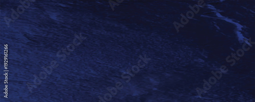 Dark, deep navy blue textured background with vignette. Grungy midnight blue paper or wall texture backdrop.