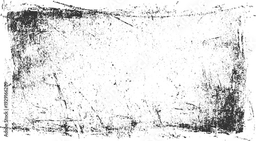 Grungy distressed black and white textured background with scratches and speckles grunge
