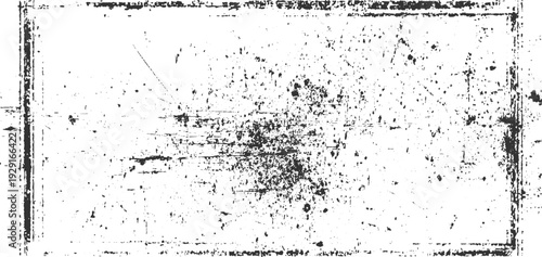 Black and white textured grunge background with scratches and speckles