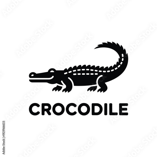 A stylized black crocodile illustration with the word crocodile below