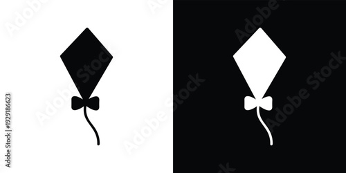 Black and white diamond shaped kites with bows on tails black kite white kite bow on kite tail