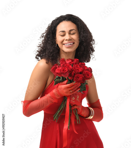Beautiful young African-American woman with bouquet of roses on white backgro...