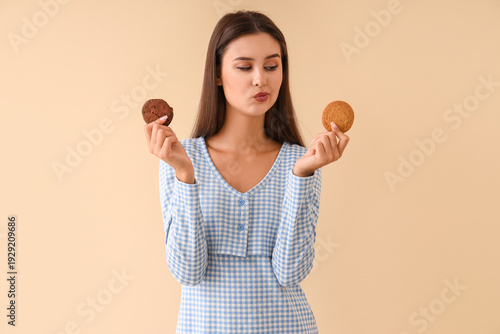 Thoughtful young woman with...