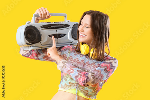 Happy young woman with mode...