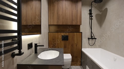 Elegant bathroom design featuring warm lighting and modern fixtures