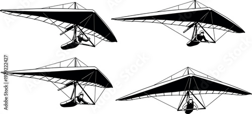 Set of black and white vector silhouette illustrations of flying hang gliders for extreme outdoor sports and adventure design projects.