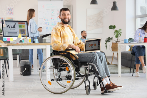 Male designer in wheelchair...