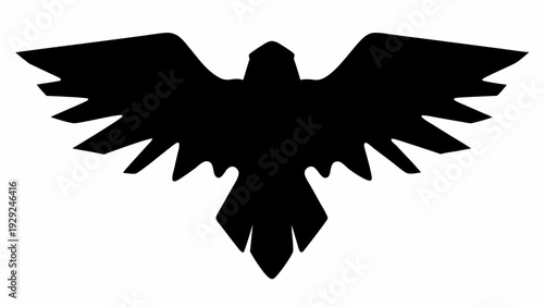 Majestic black bird in mid flight with outstretched wings