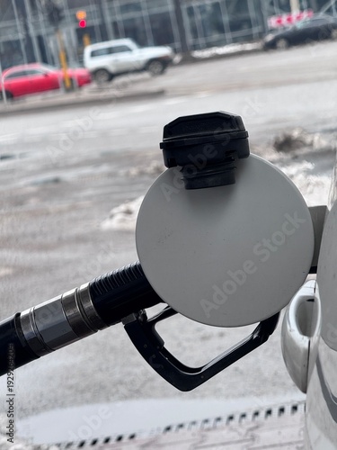  gas station, filling a car with gasoline