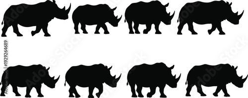 Rhinoceros silhouette collection featuring diverse poses of wild African rhinos walking and standing isolated on a clean white background vector illustration set