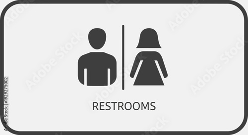 Sign indicating restrooms for men and women in a public facility