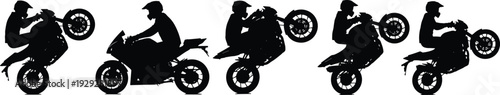 Black silhouettes of motorcyclists performing stunts on bikes motorcycle