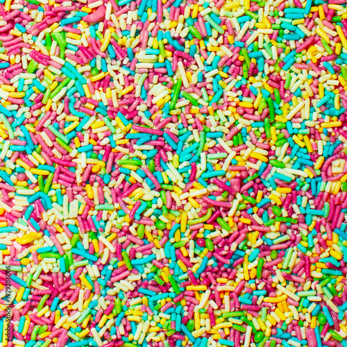 Candy colorful sprinkles background. Creative food concept.Top view.