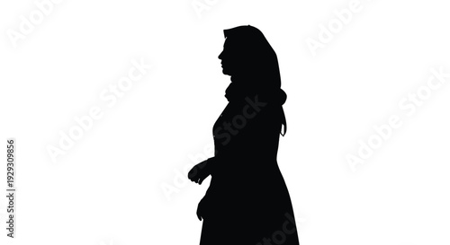 Silhouette profile of a woman wearing a headscarf standing against a stark white background