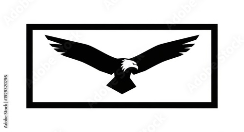 Majestic eagle silhouette soaring with outstretched wings, a symbol of freedom.