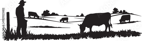 Black silhouette of farmer standing by fence with grazing cows