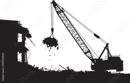 Silhouette of crane demolishing building demolition