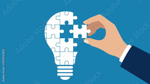 Hand placing puzzle piece in light bulb  business concept