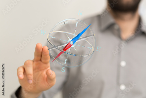 A person uses a digital com...