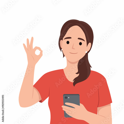 Woman holding smartphone okay gesture approval.