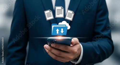 Businessman in suit holding phone with file transfer overlay