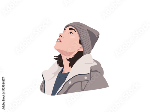 Young woman wearing a beanie and jacket looking upwards.