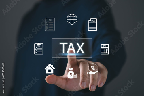 Close up of hand touching virtual TAX button with financial icons, symbolizing tax payment, online filing, accounting, audit and compliance. Digital taxation and business finance concept.