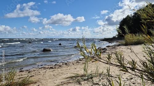 Wide sea horizon with soft waves and dramatic evening sky. Natural ambient ocean sound recorded live. Atmospheric 4K coastal landscape video.