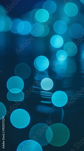 Vertical abstract background with soft blue and cyan bokeh circles, ideal for digital art, backgrounds, and vibrant themes.