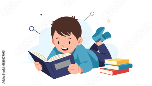 Young boy lies comfortably on the floor while reading an interesting book with several other books stacked nearby.