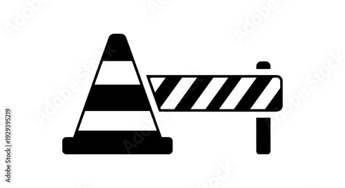 Traffic cone and barrier indicating road construction or restricted access.