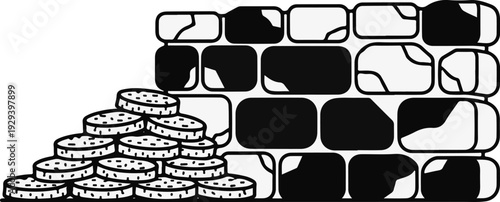 Stacked round objects with textured tops next to a brick wall