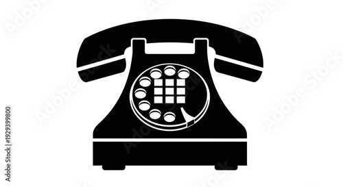 Vintage black rotary telephone with white accents on a white background.