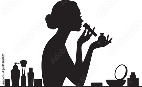 Woman applying perfume from bottle with cosmetics on table